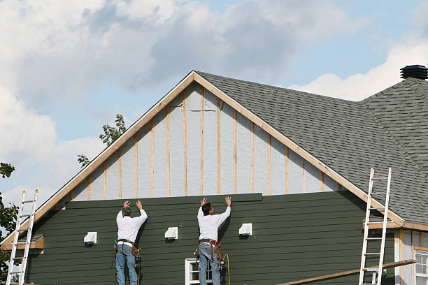 Professional Siding technician working in New Philadelphia, OH